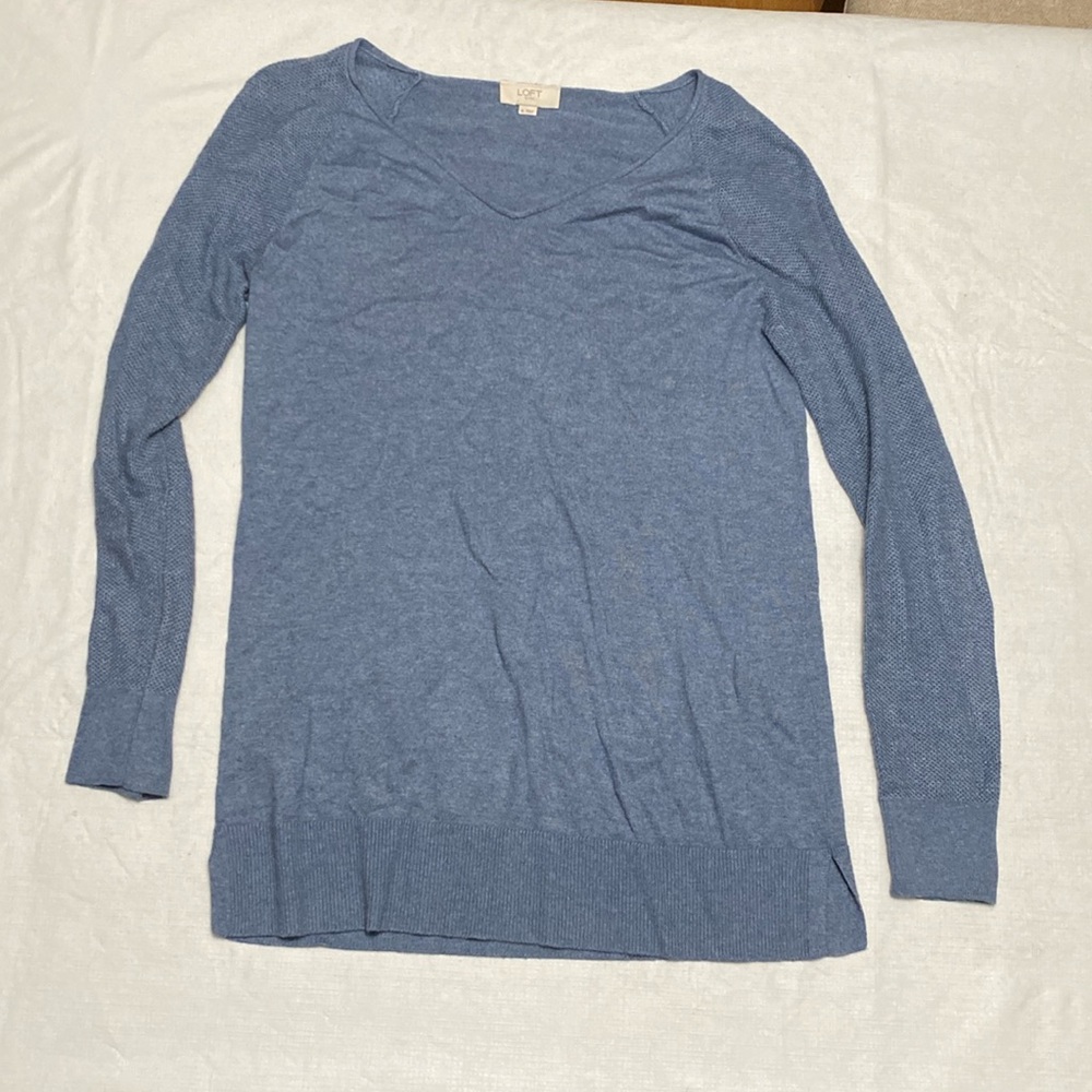 Light blue knitted lightweight long sleeved v neck shirt by Loft good condition